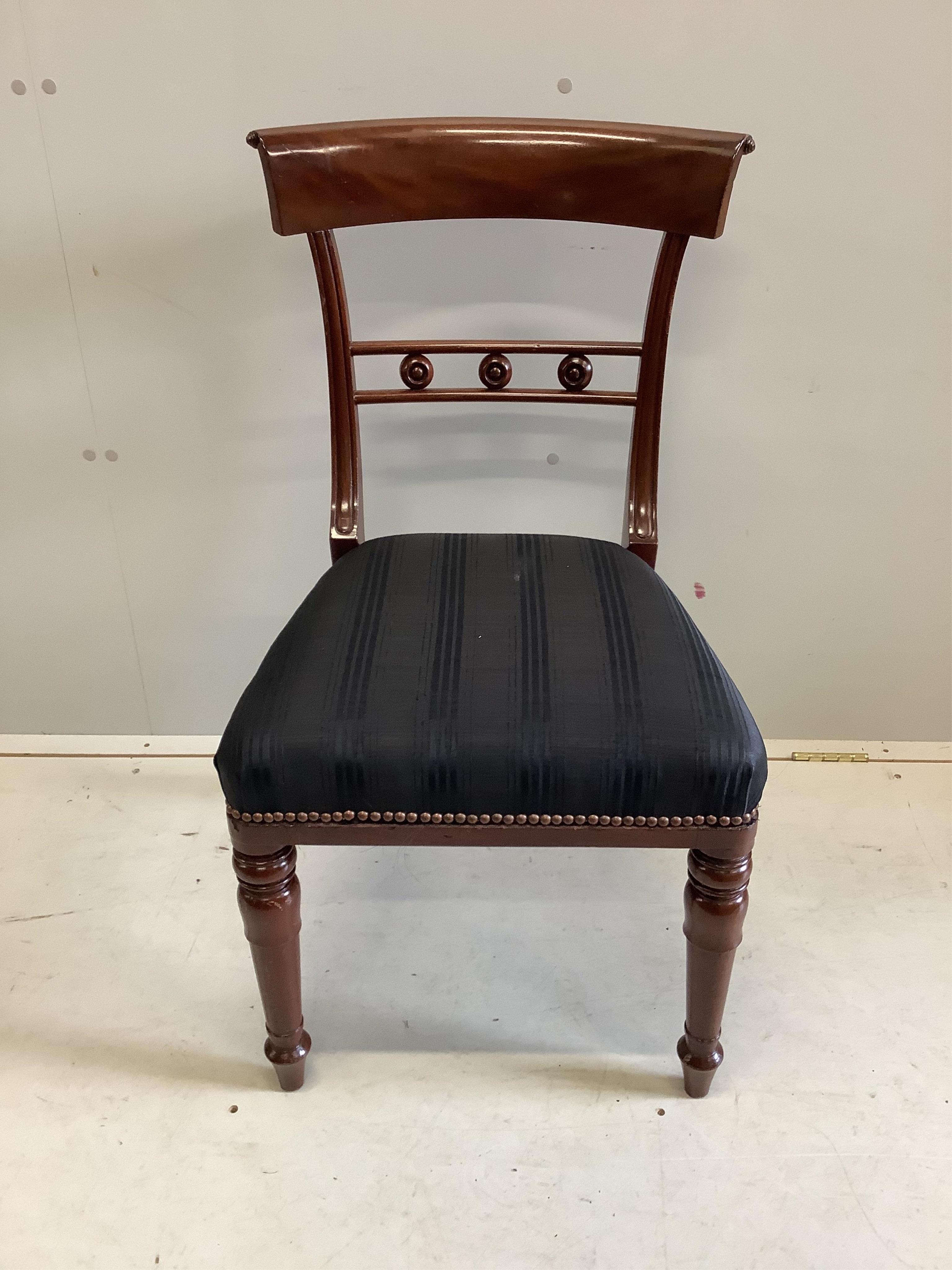 A set of twelve Regency style mahogany dining chairs, width 48cm, depth 45cm, height 88cm. Condition - fair to good